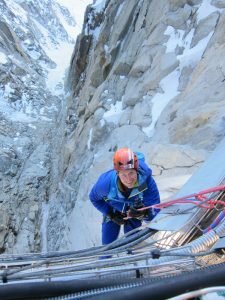 Nervous smiles on the free hanging abseil